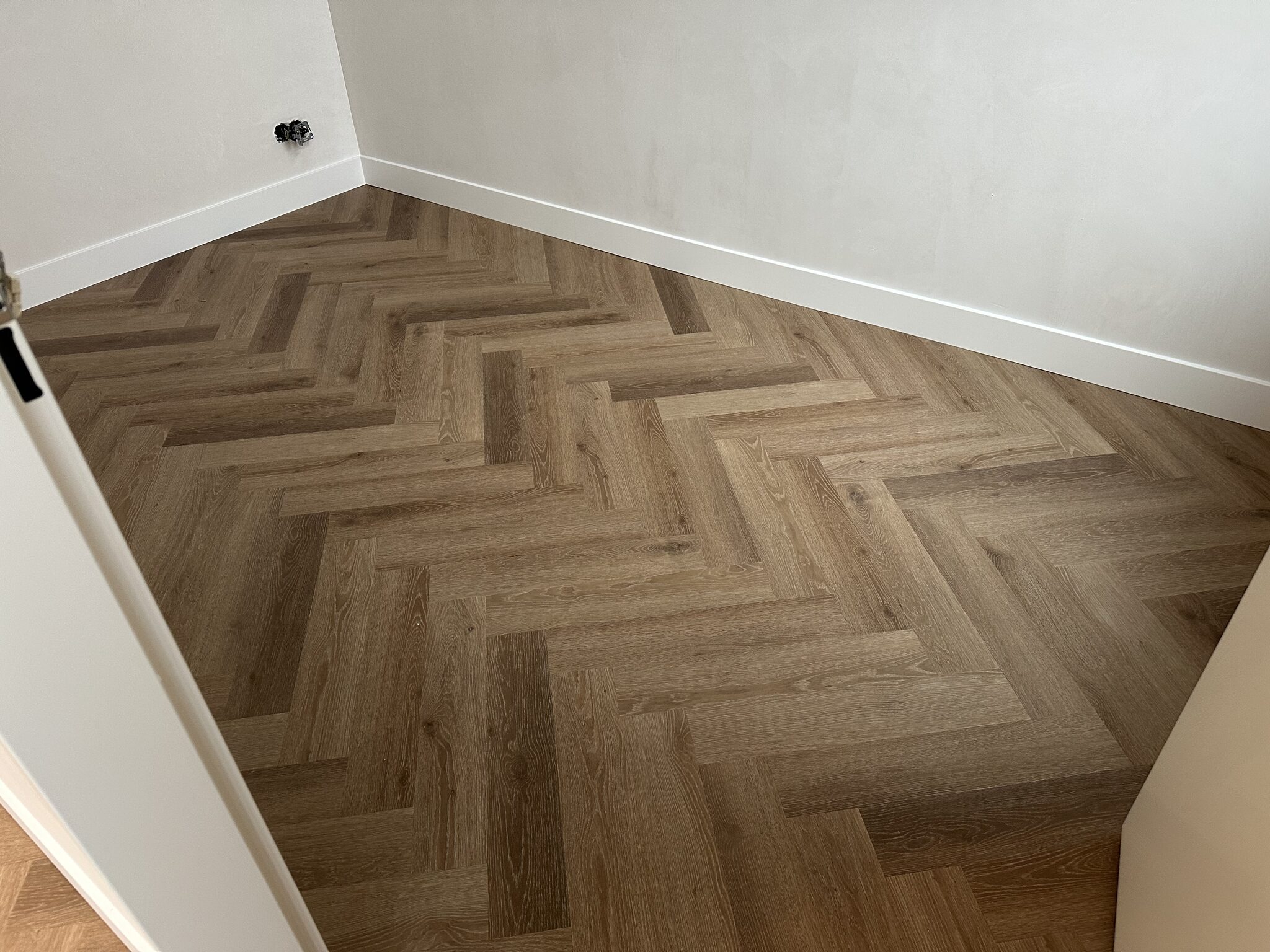 PVC visgraat vloer en traprenovatie Almere - foto 5